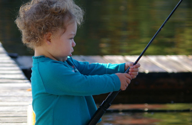 Fishing on dock at Pine Vista Resort.