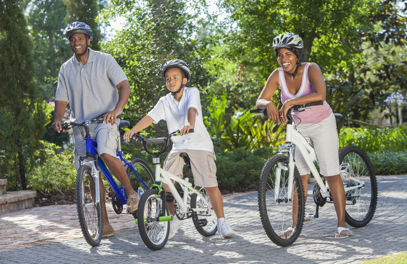 Family biking at Mirror Lake Inn Resort & Spa.