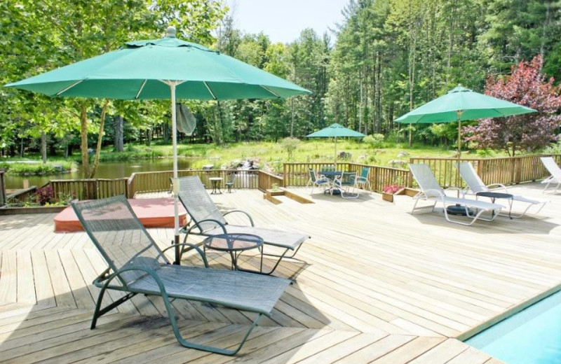 Relax by the Pool at Enchanted Manor of Woodstock