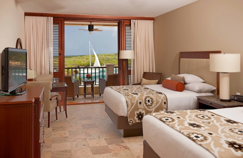 Guest room at Hyatt Regency Curacao Golf Resort, Spa and Marina.