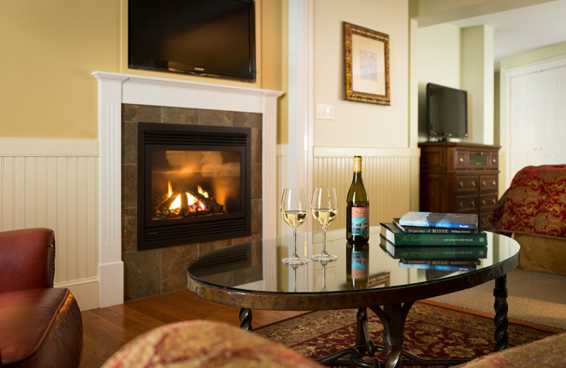 Guest room with fireplace at Grand Harbor Inn.