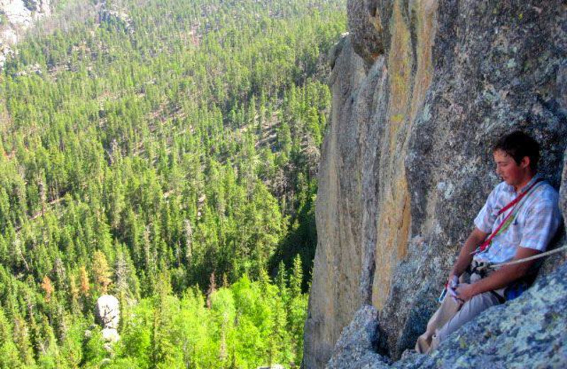 Mountain climbing near Backroads Inn and Cabins.