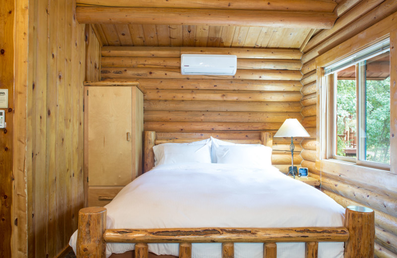 Cabin bedroom at North Forty Resort.