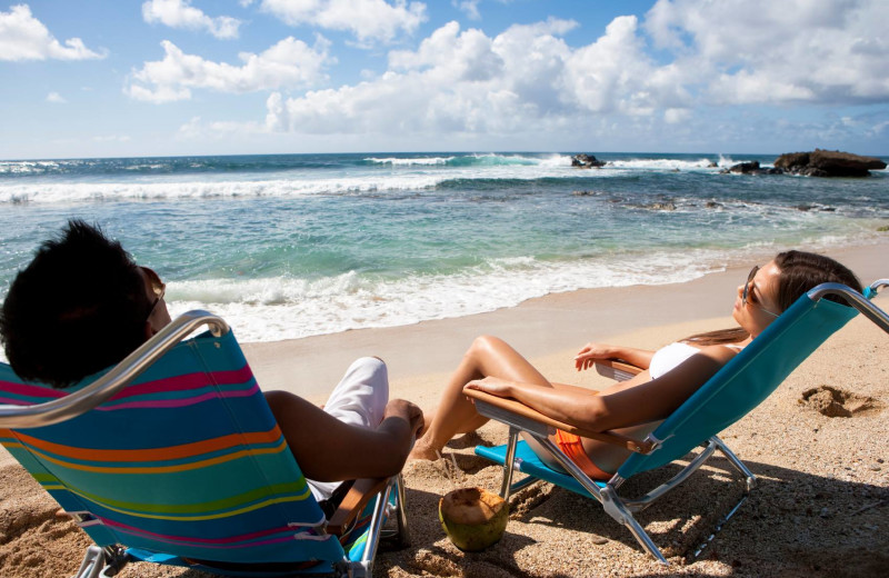 Relaxing on the beach at Gold Key Resorts.