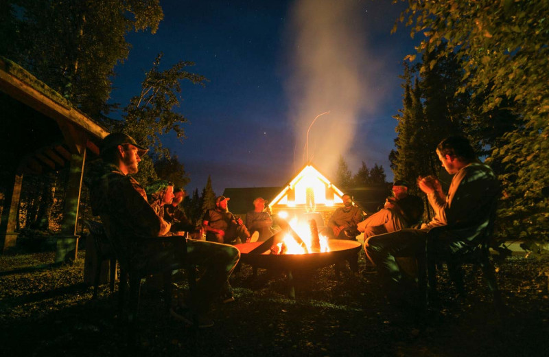 Family bonfire at All Alaska Outdoors Lodge.