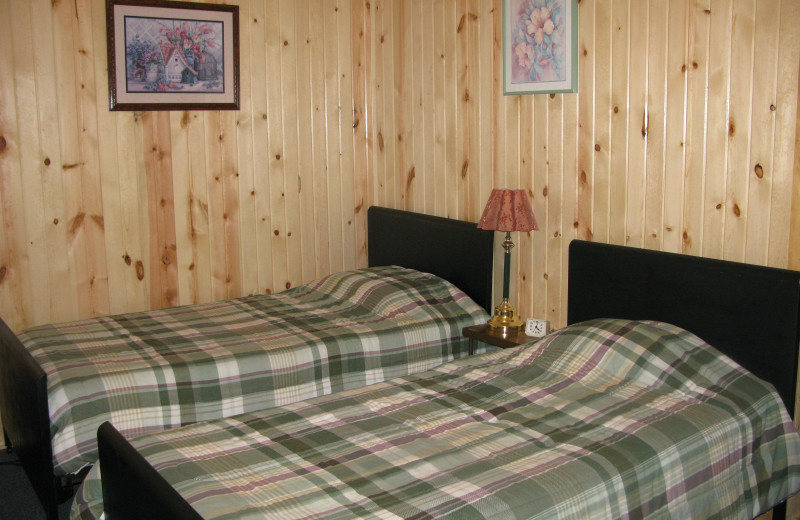 Cabin bedroom at Harris Hill Resort.