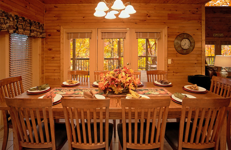 Cabin dining room at Timber Tops Luxury Cabin Rentals.