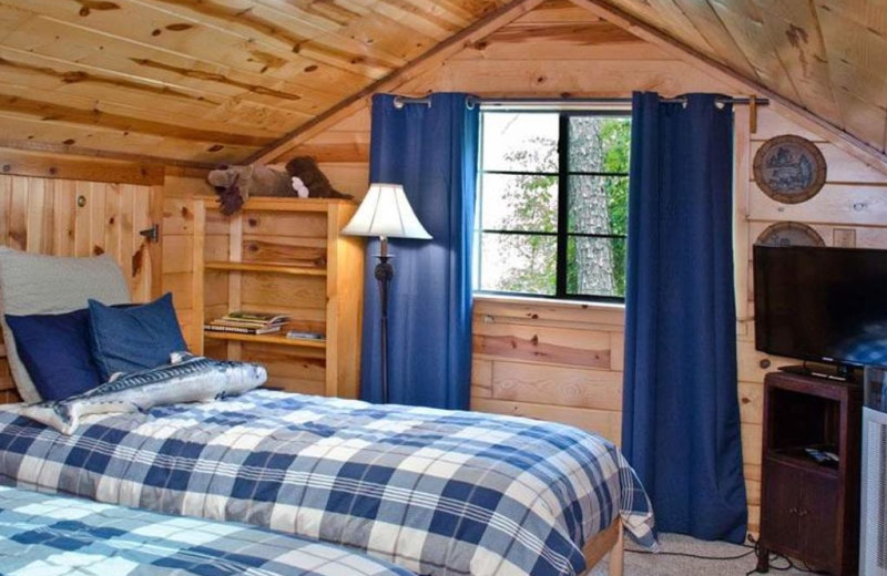 Cabin bedroom at Lake Mountain Cabins.