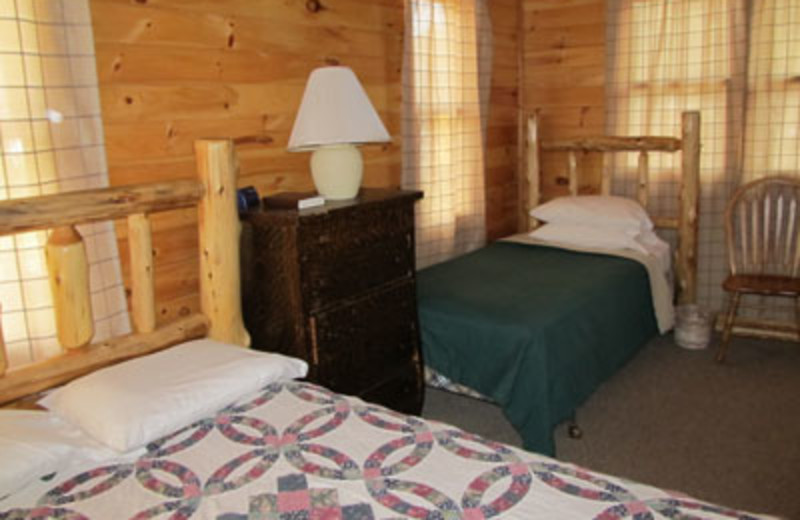 Cabin guest room at Lac La Belle Lodge.