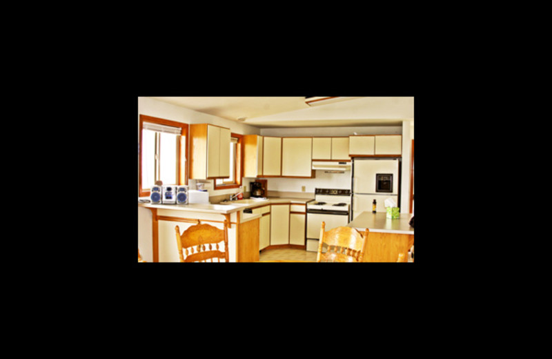 Guest kitchen view at Ocean Shores Ocean View Homes.