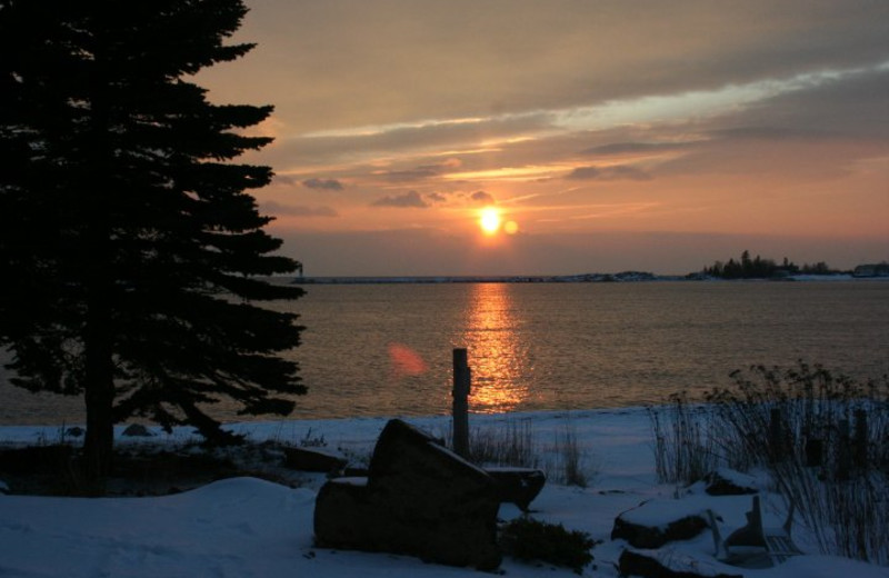 Sunset over Lake Superior at Cobblestone Cove Villas.