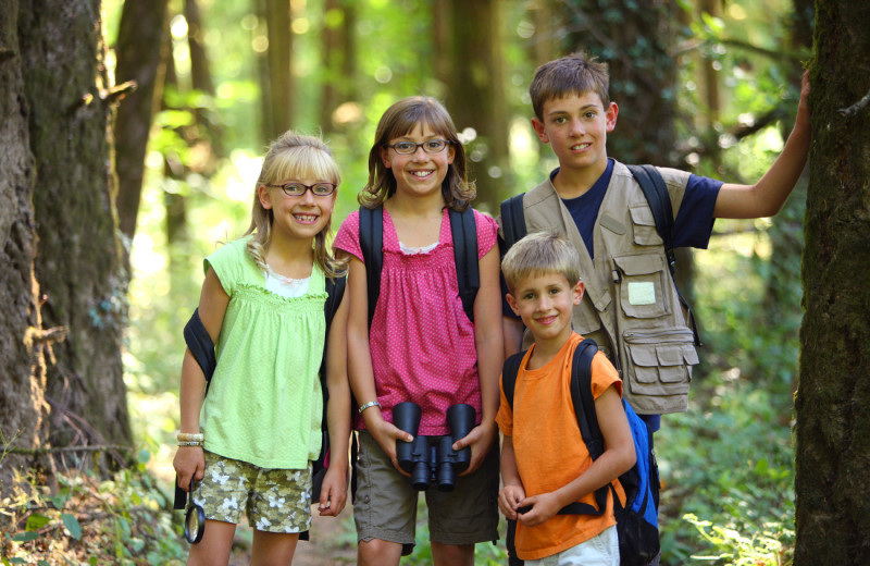 Family hiking at Water's Edge Inn & Conference Center.