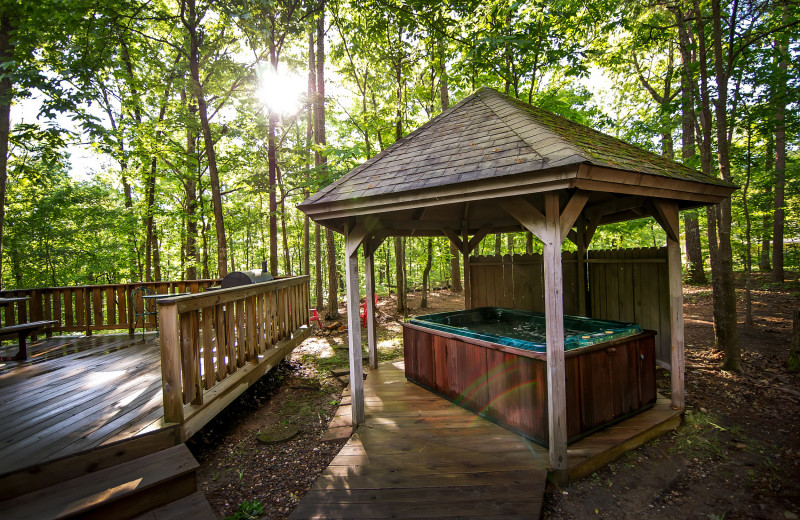 Cabin hot tub at Kiamichi Country Cabins.