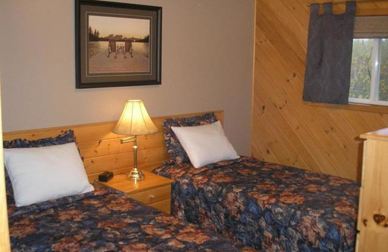 Cabin bedroom at Pleasant Cove Resort.