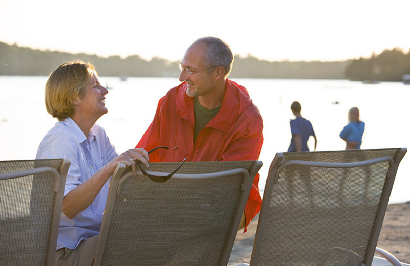 Couple on the beach at The Osthoff Resort.
