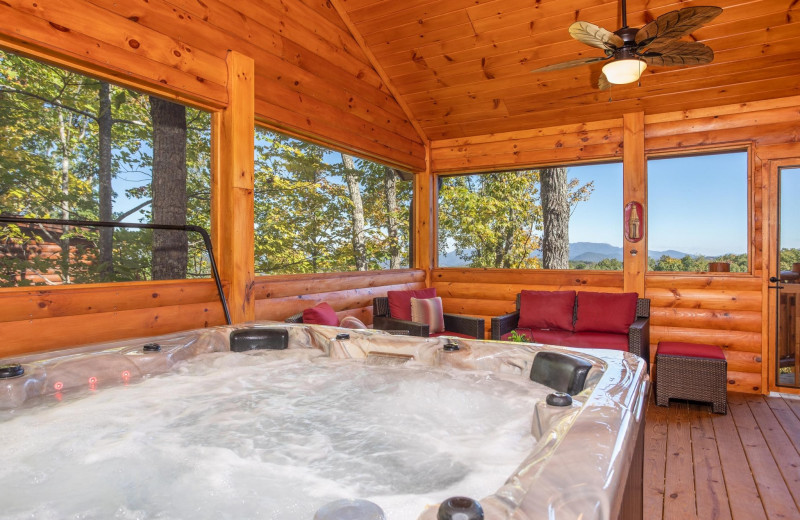 Cabin hot tub at American Patriot Getaways, LLC.