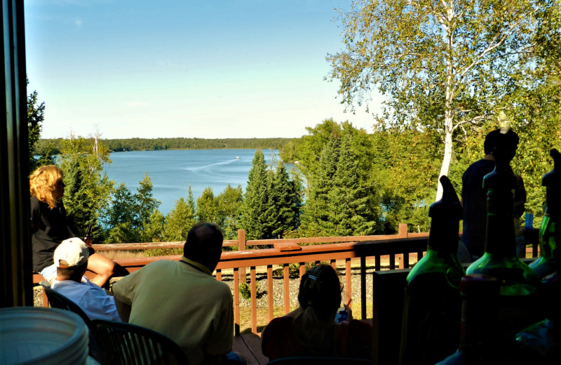 Family on balcony at Schatzi's 4 Seasons Resort.