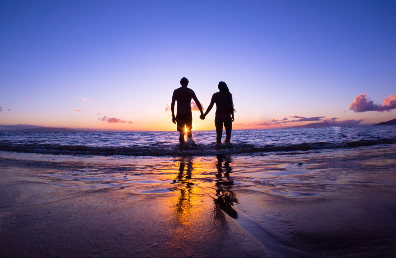 Couple on beach at Jersey Cape Realty.