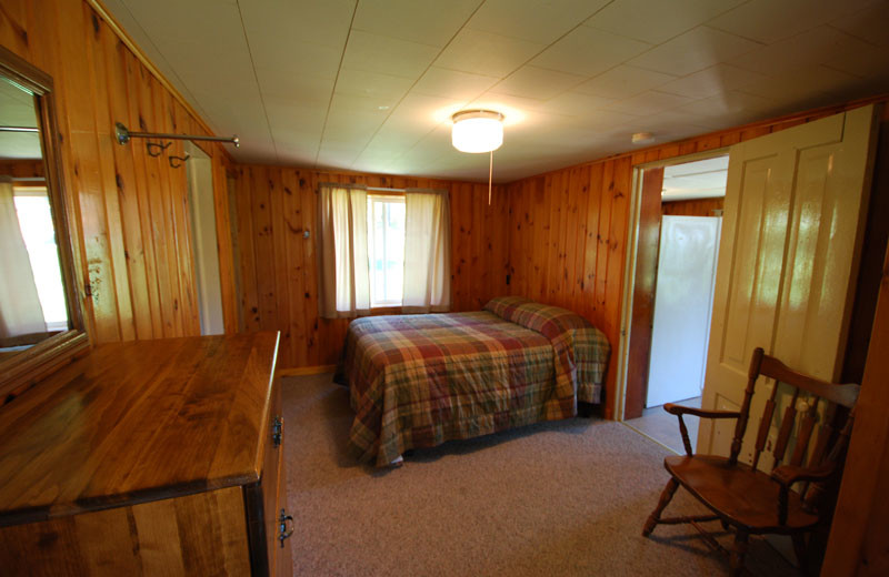 Cabin bedroom at Birch Forest Lodge.