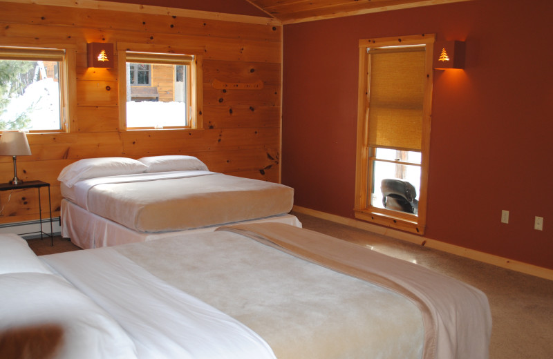 Cabin bedroom at New England Outdoor Center.