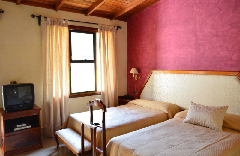 Guest room at Martino Resort & Spa.