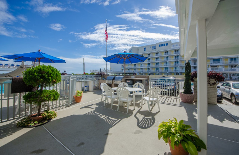 Outdoor patio at Fleur De Lis Beach Resort.