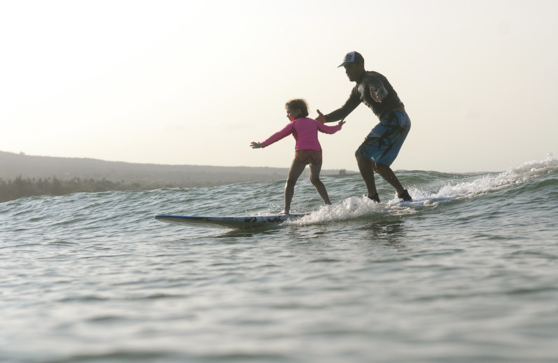 Surfing at Lumeria Maui.