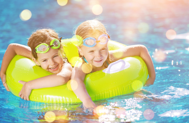 Kids swimming in pool at Driftwood Resort.