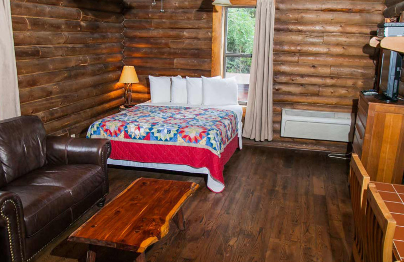 Cabin bedroom at Hideaway Ranch & Refuge.