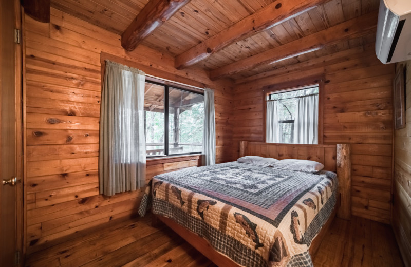 Cabin bedroom at Buffalo River Outfitters.