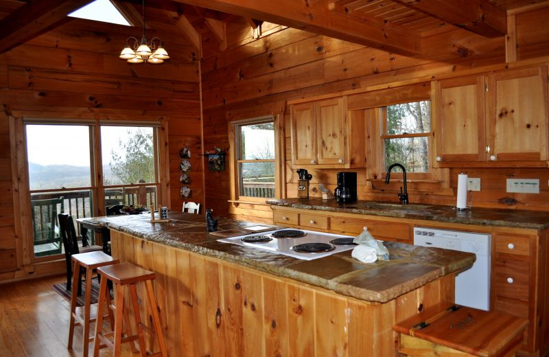 Cabin kitchen at Cuddle Up Cabin Rentals.