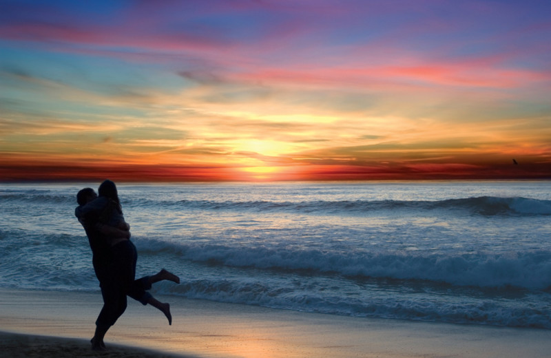 Couple on beach at Tamarack Lodge.