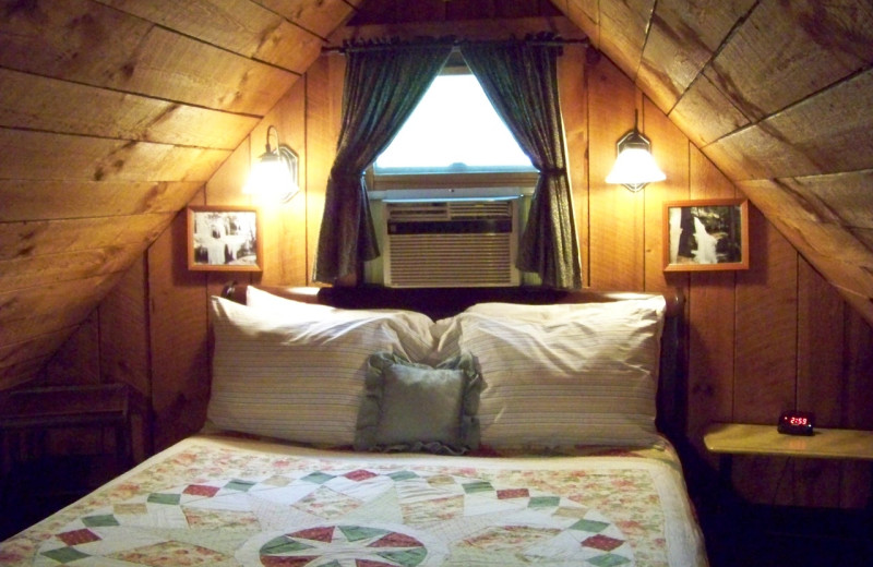 Cabin bedroom at Hocking Hills Cabins.