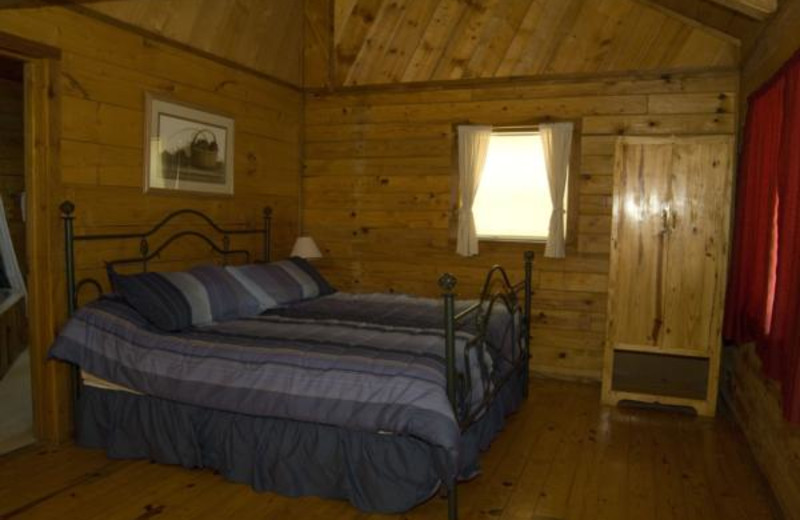 Cabin bedroom at Buffalo River Outfitters.