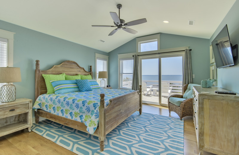 Rental bedroom at Joe Lamb Jr. & Associates Vacation Rentals.