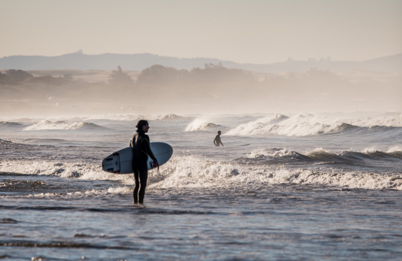 Surfing at Moontide Motel, Cabins and Apartments.