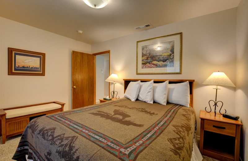 Cabin bedroom at Morrison's Rogue River Lodge.