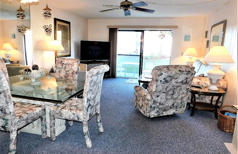 Rental living room at Family Sun Vacation Rentals.