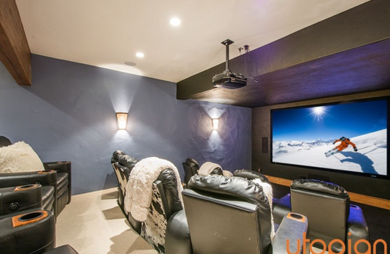 Rental movie room at Utopian Luxury Vacation Homes.