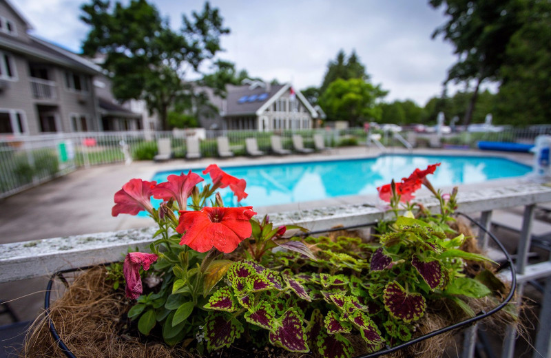 Outdoor pool at Waterbury Inn Condominium Resort.