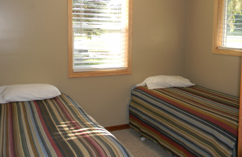 Cabin bedroom at Otter Tail Beach Resort.