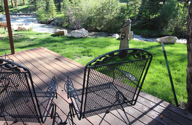 Guest patio at Boulder Brook on Fall River.