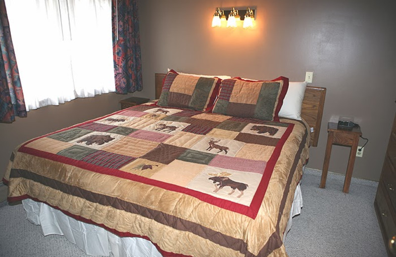 Chalet bedroom at Timber Creek Chalets.