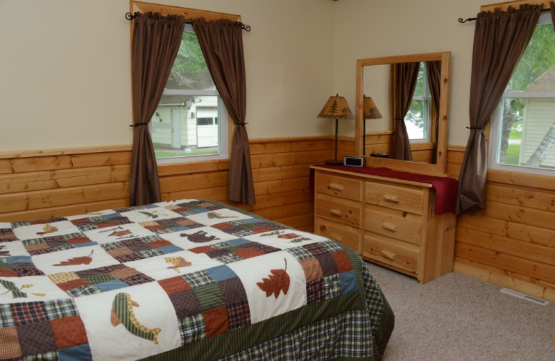 Cabin bedroom at Riverside Resort.