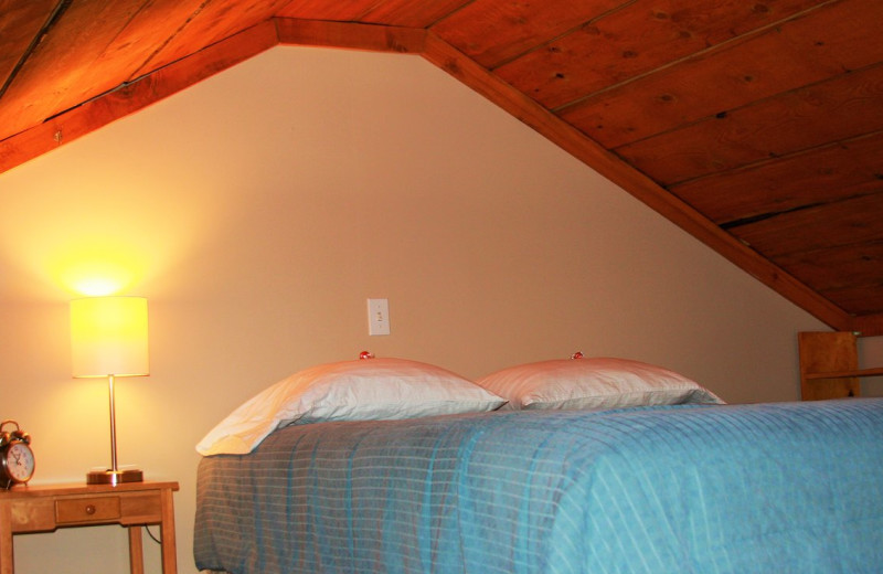 Cabin bedroom at Sleepy Bear Cabins.