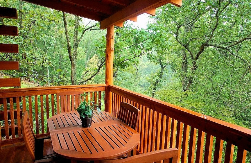 Cabin balcony at Lake Forest Luxury Log Cabins.