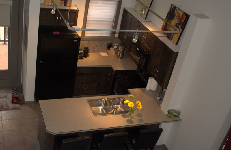 Rental kitchen at realTopia Vacation Rentals.