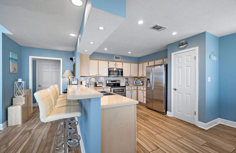 Rental kitchen at Gary Greene Vacation Rentals.