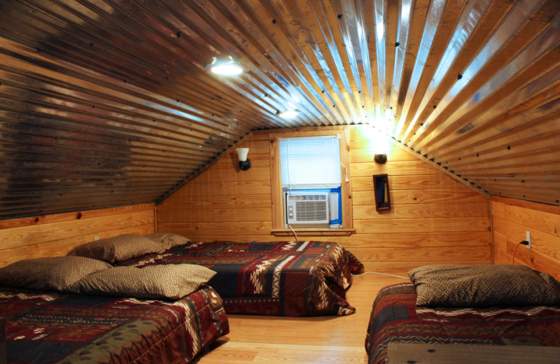 Cabin bedroom at Berry Creek Cabins.