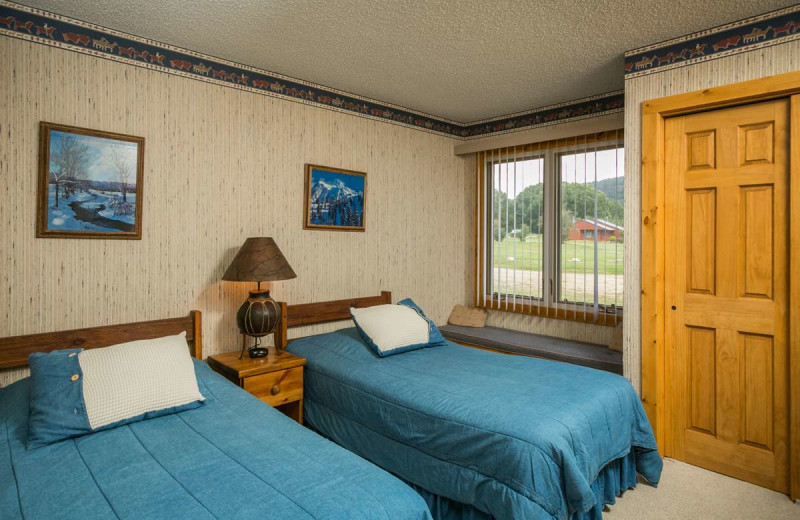 Cabin bedroom at The Glen Eden Resort.